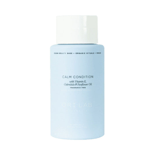 Hair conditioner bottle, light blue with white cap and CALM label, 300 ml