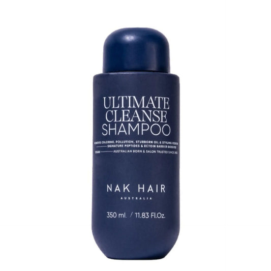 Ultimate Cleanse Shampoo bottle, dark blue with white label and 350 ml text