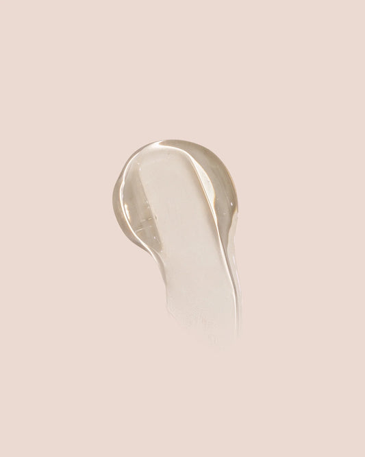 Shampoo gel swatch, clear-white liquid in a dollop shape