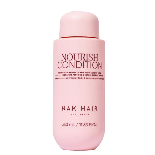 Pink Nourish conditioner bottle, 350 ml, with NAK Hair branding and red cap