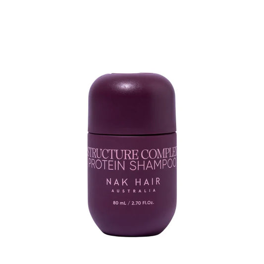 Purple NAK Hair protein shampoo travel bottle, 80 ml, front label visible