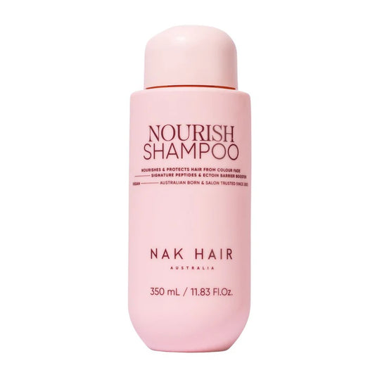 NAK Hair Nourish Shampoo bottle, pink 350 mL, red cap