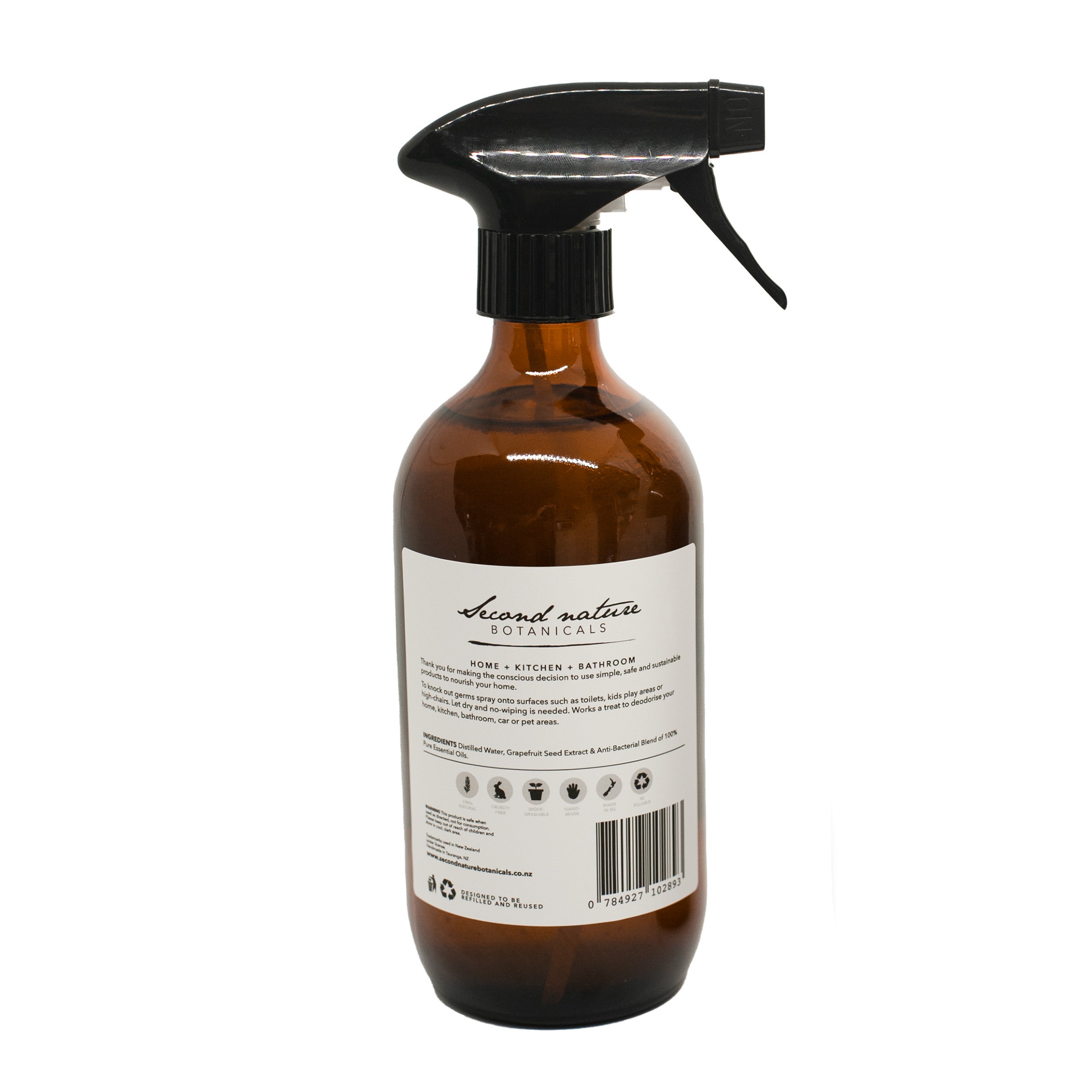 Natural disinfecting spray bottle with amber glass, black trigger sprayer, back label