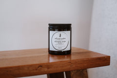 Second Nature Botanicals bath salt jar, dark glass with white label