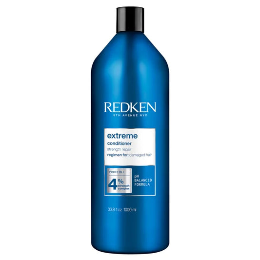 Redken Extreme conditioner bottle, blue with black cap and label