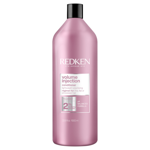 Redken Volume Injection Conditioner bottle with pink body and black cap