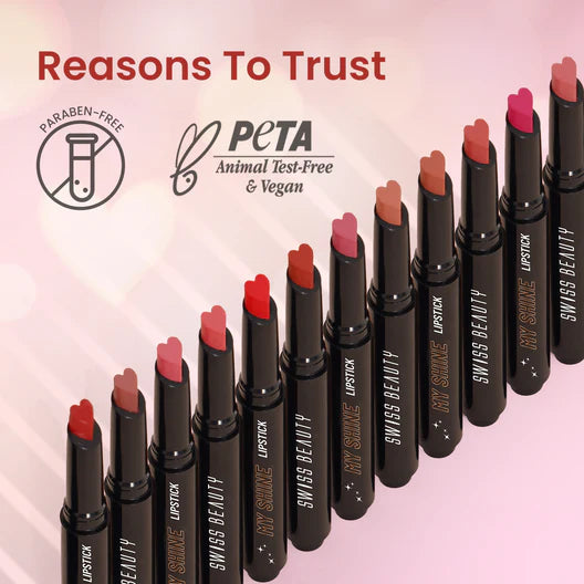 Row of heart-top lipsticks with slim black tubes in red and pink shades