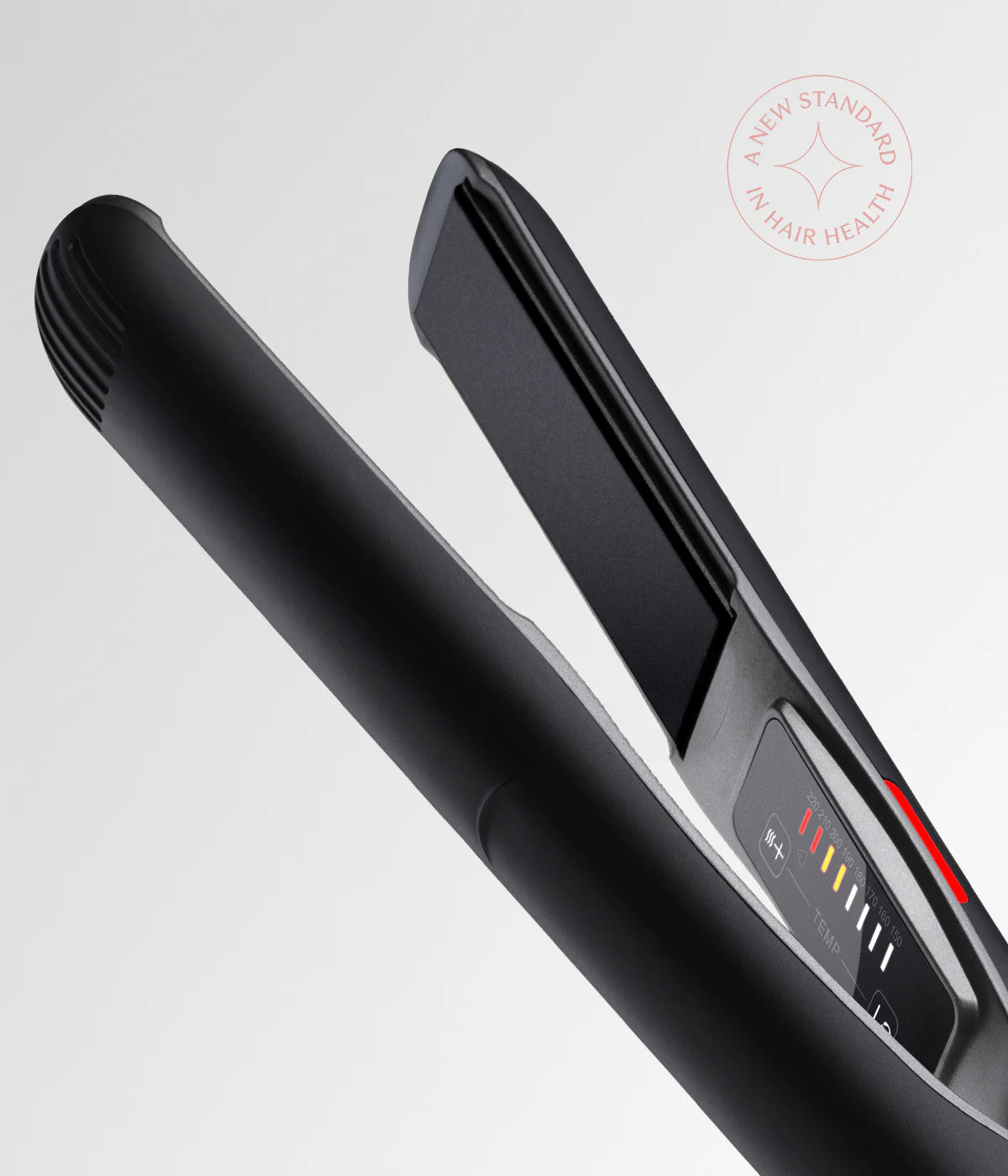 Black hair straightener with vented barrel and digital display panel