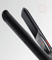 Black hair straightener with vented barrel and digital display panel