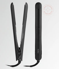 Black hair straightener with open clamshell plates and attached cord