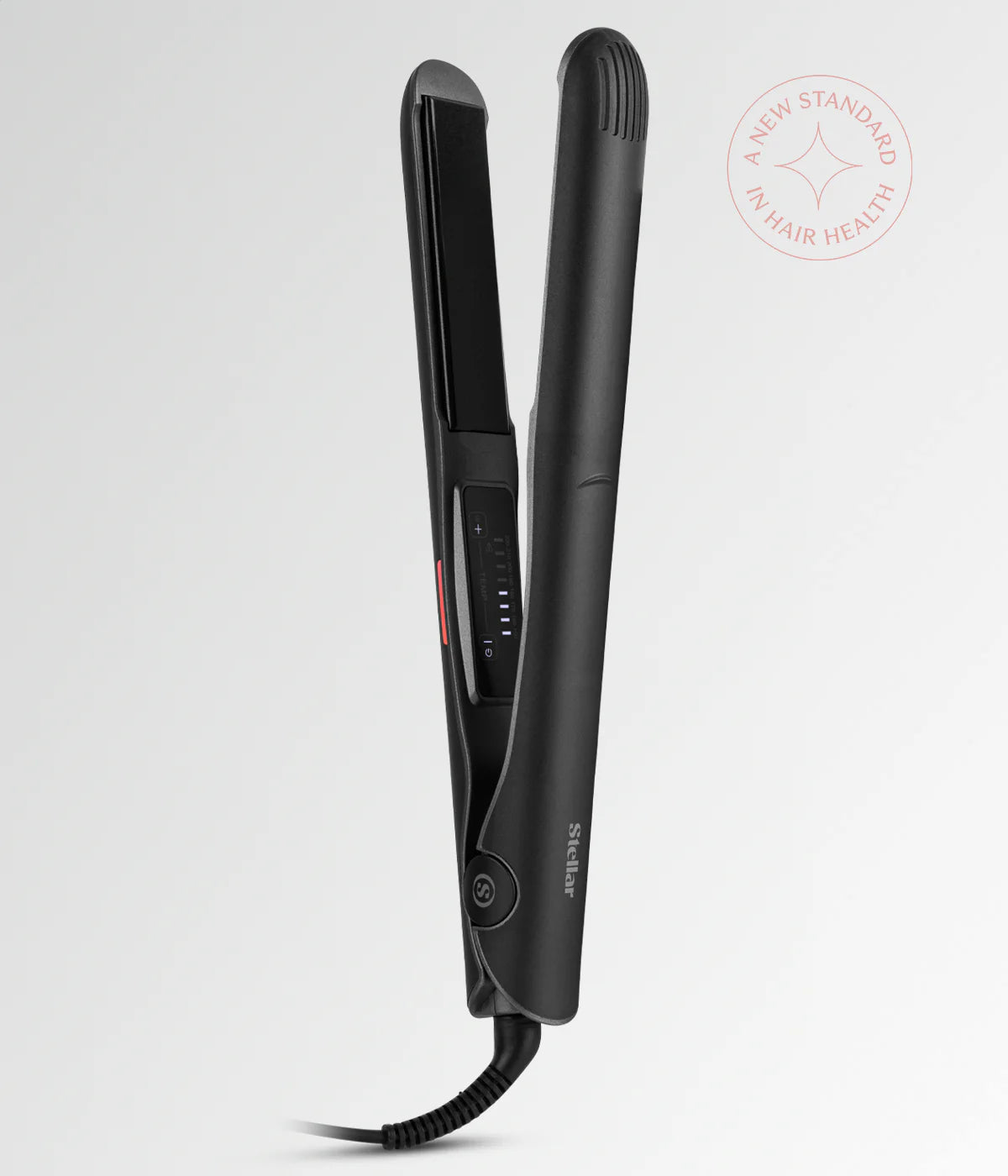Black hair straightener closed with side control panel and power cord