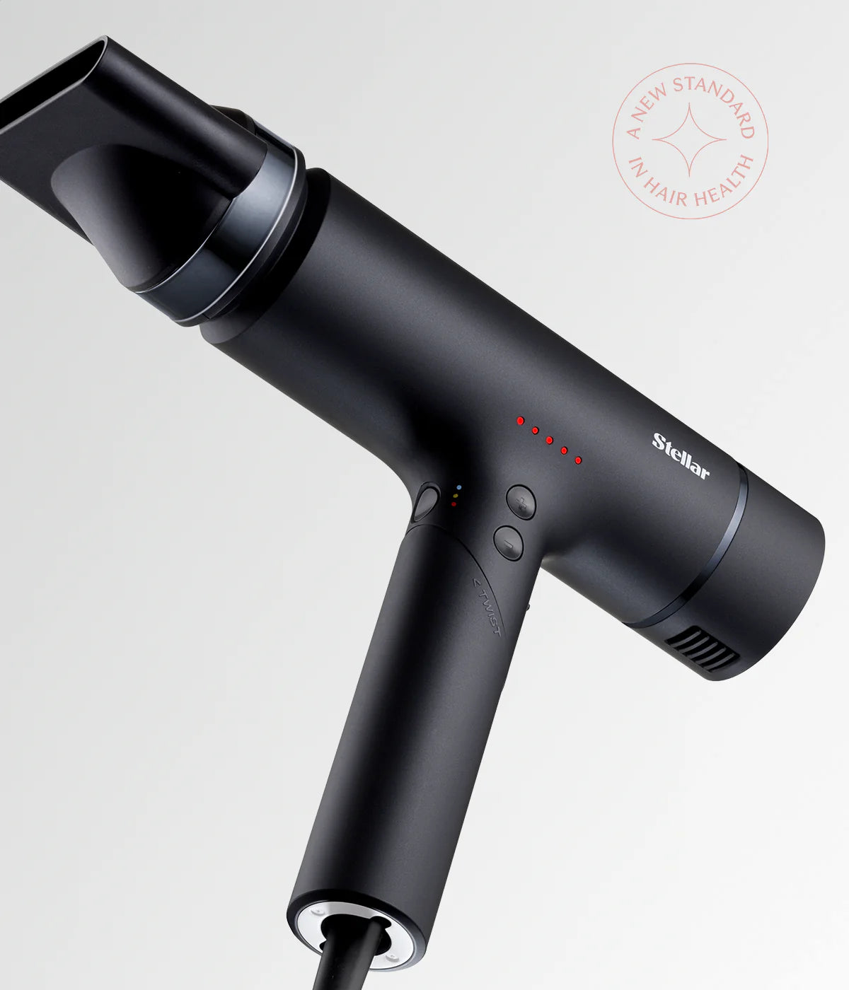 Black hair dryer with angled concentrator nozzle and air vents
