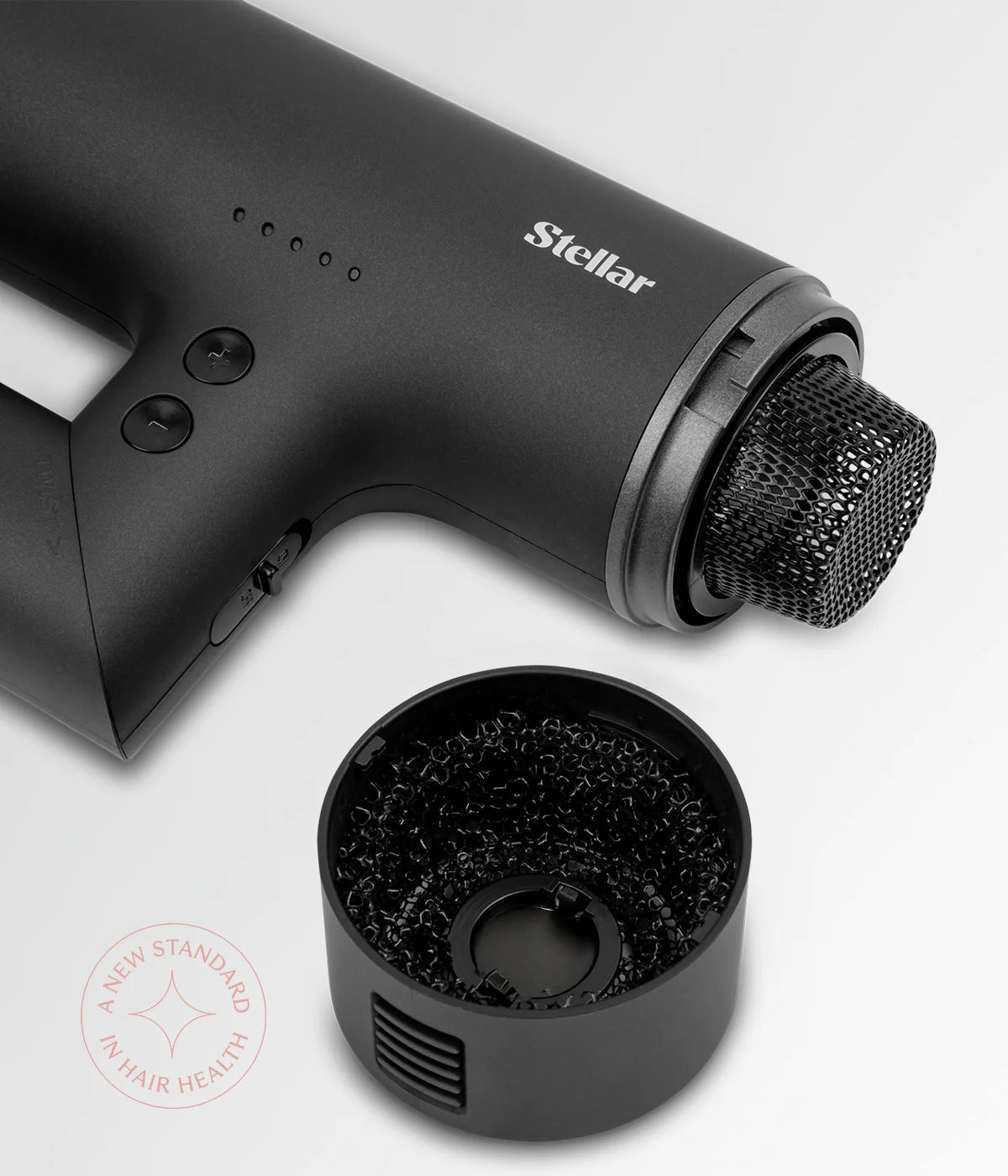 Black hair dryer with front mesh filter and removable round grille piece