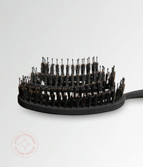 Black round vent brush head with densely packed bristles