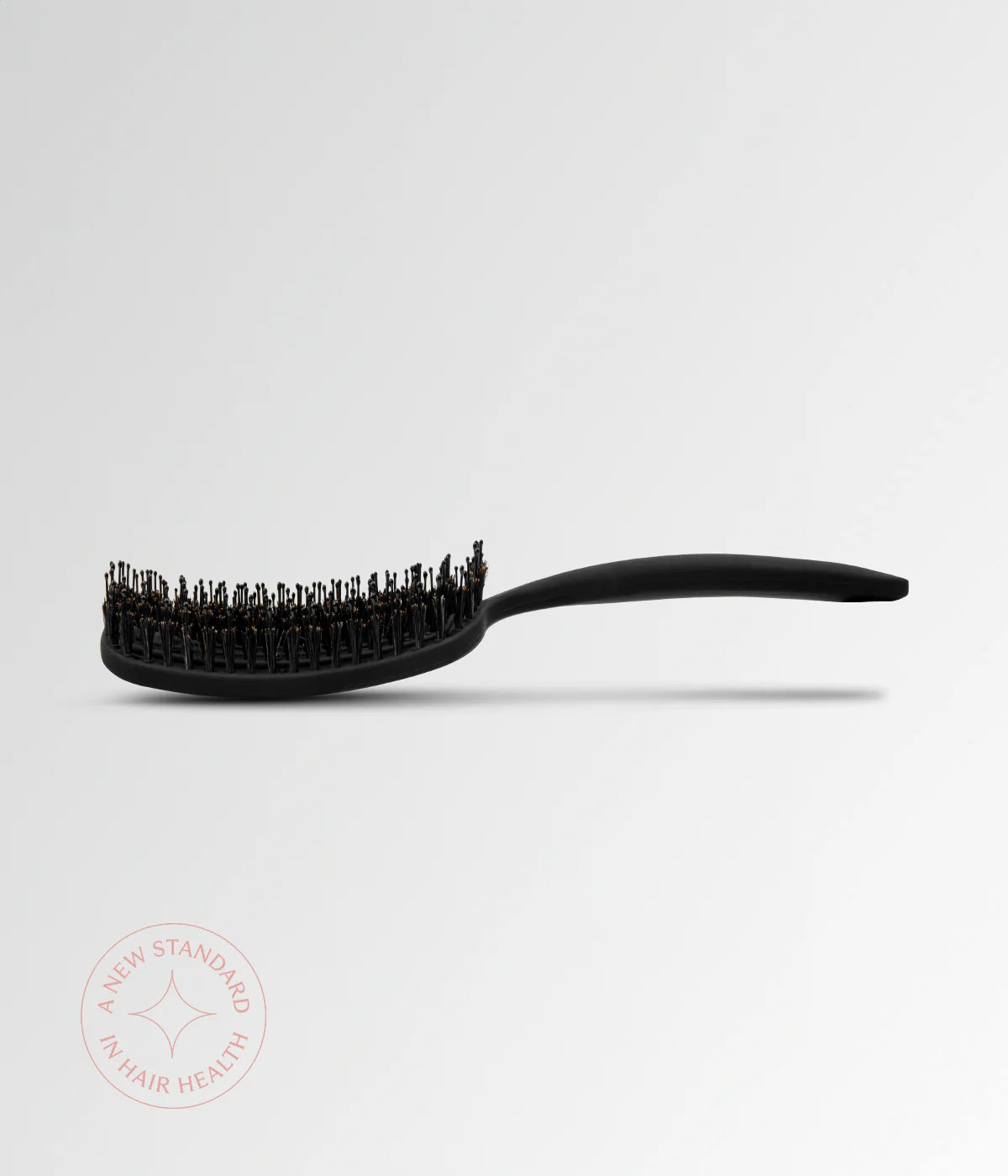 Black vent brush with rounded head and short bristles, extended handle