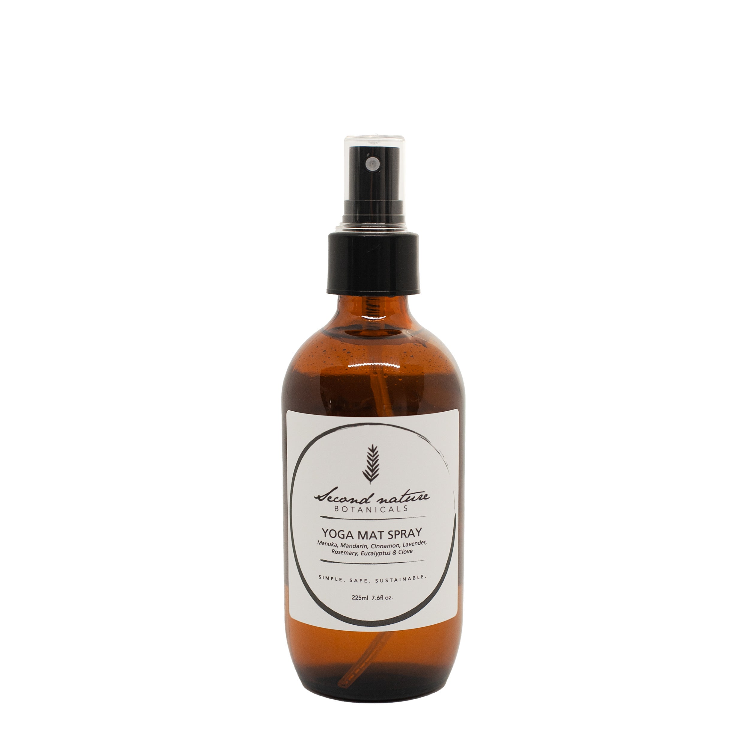 Yoga mat spray bottle, amber liquid with black pump and front label