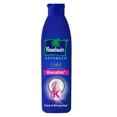Blue Parachute Advanced Gold coconut hair oil bottle with keratin label