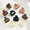 Small square hair claw clips, assorted frosted latte shades in various colors.