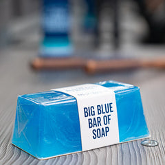 Blue wrapped soap bar with white label reading BIG BLUE BAR OF SOAP