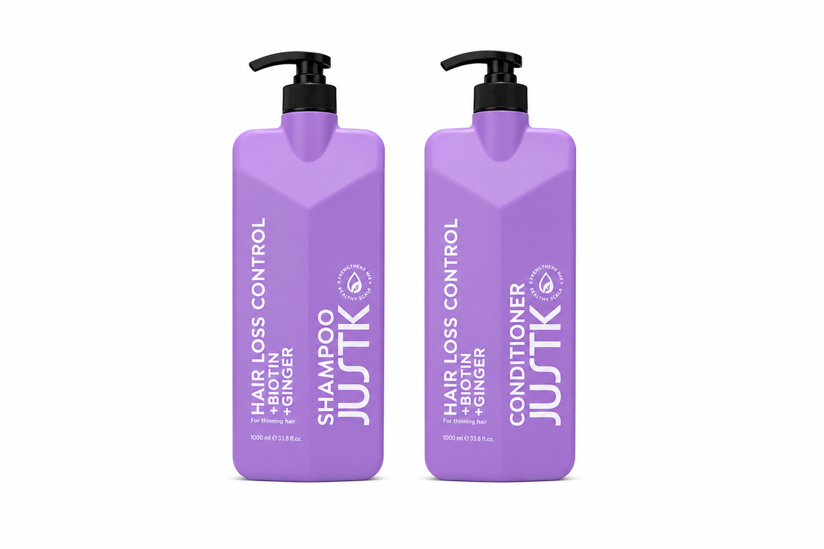 Purple biotin and ginger shampoo and conditioner bottles with black pump