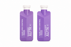 Purple JUSTK hair shampoo and conditioner bottles, twin pack with pump tops