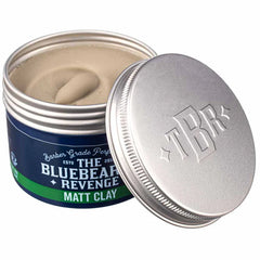 Opened Matt clay jar showing pale cream clay and silver lid