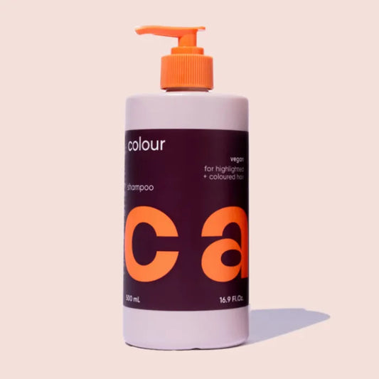 Hair colour shampoo bottle with orange pump, 16.9 fl oz, purple label