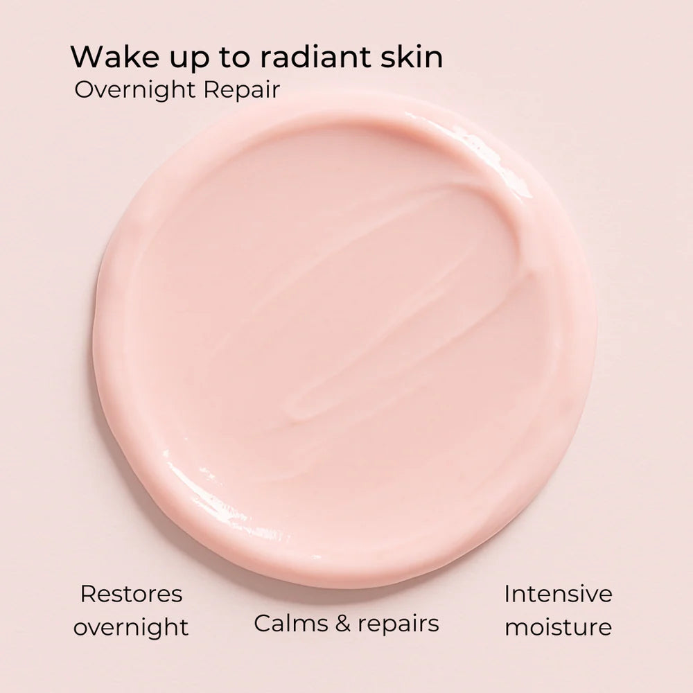 Pink overnight repair cream texture in a smooth circular layer