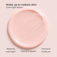 Pink overnight repair cream texture in a smooth circular layer