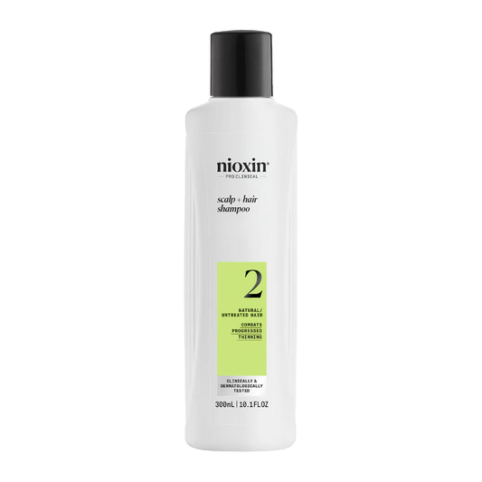 Nioxin scalp + hair shampoo bottle, white with black cap and green number 2 label