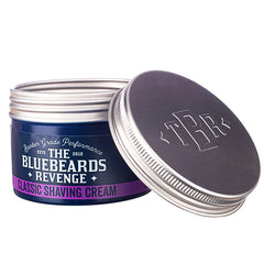 Blue shaving cream jar with silver lid open, black interior lid and Classic Shaving Cream label
