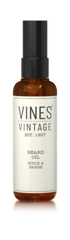 Amber beard oil bottle with black cap, label reading VINES Vintage and 100ml