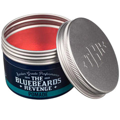Pomade jar with open lid, showing red cream and blue base label